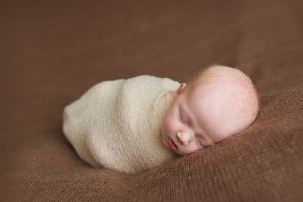 Seattle newborn photographer | wrapped newborn baby girl