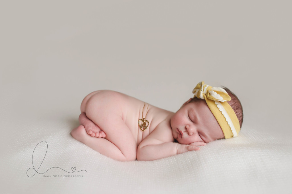 Seattle newborn photographer | baby girl gushy pose