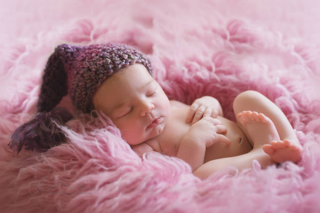 Seattle newborn photographer | baby on pink flokati