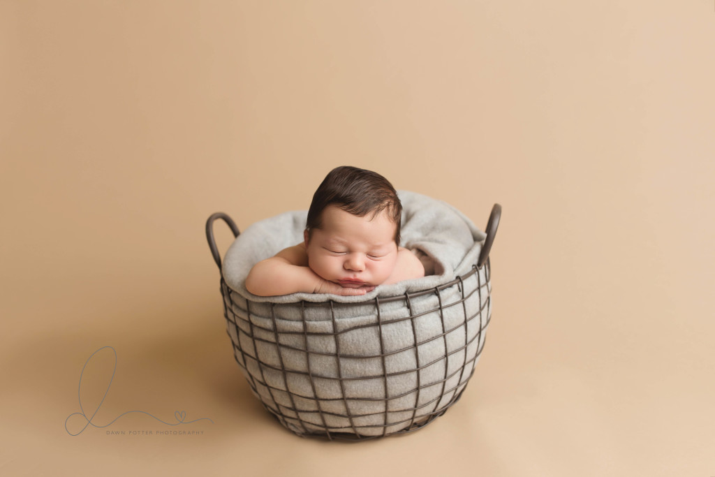 baby boy in basket