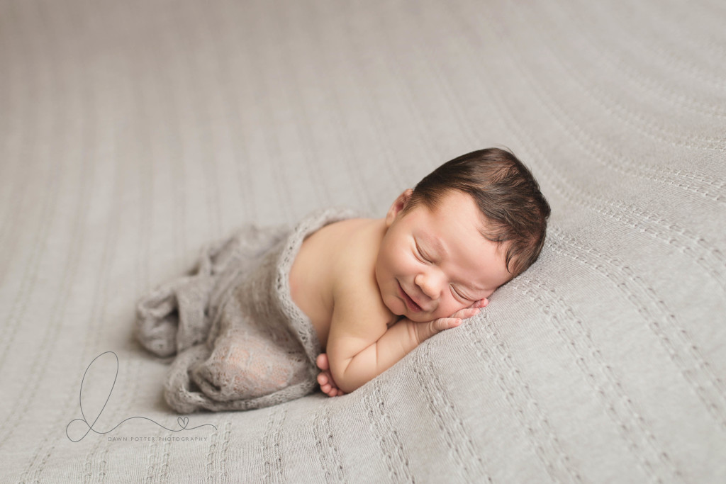 taco pose baby boy smiling