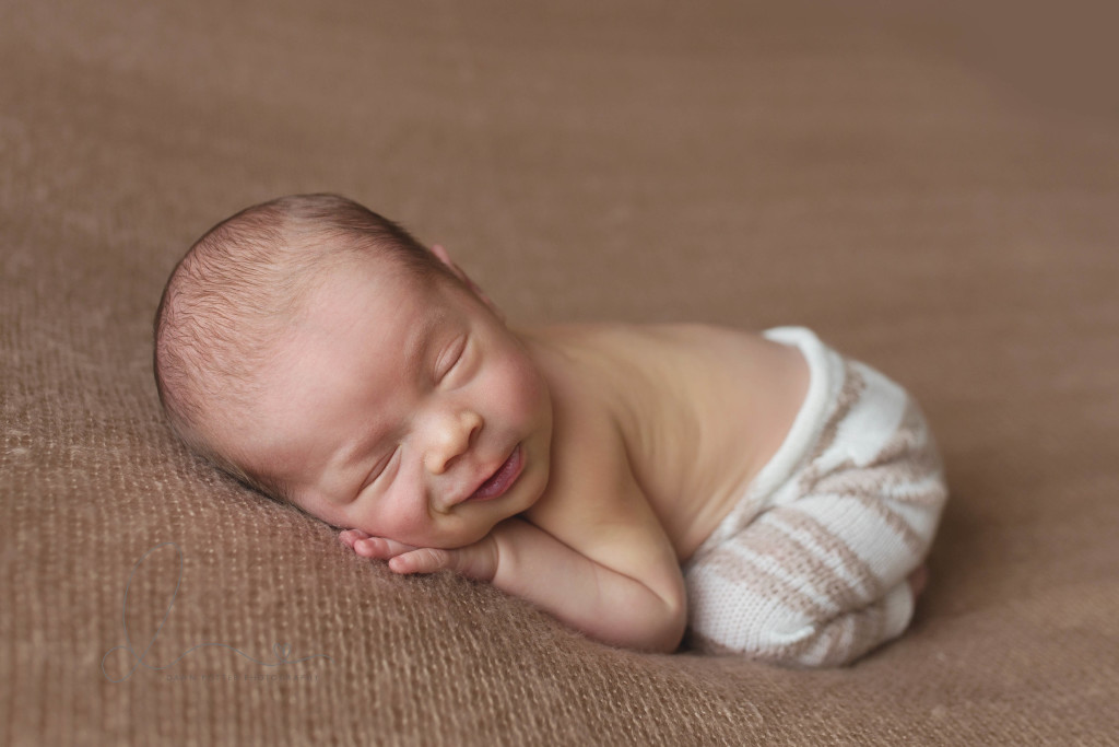 Smiling baby | sweet newborn baby boy | Bellevue Kirkland newborn baby photographer