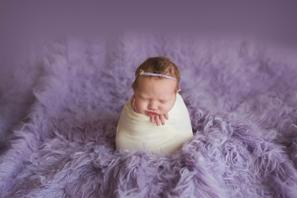 seattle baby photographer | baby girl smiling potato sack pose | maple valley newborn photographer