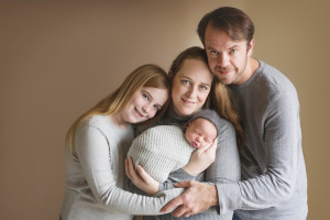 newborn baby boy wrapped with family | issaquah baby photographer