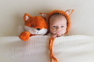 wide awake baby boy | newborn looking at camera | newborn fox bonnet | issaquah baby photographer