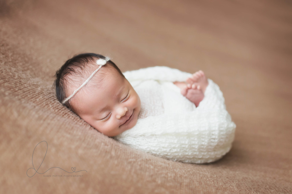 smiling baby | wrapped baby | three week old | bellevue newborn photographer