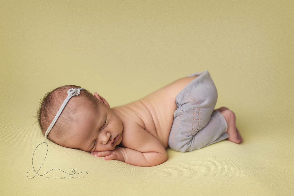 tushy pose | baby girl on yellow | Seattle newborn photography