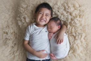 Bellevue newborn session | baby girl with big brother